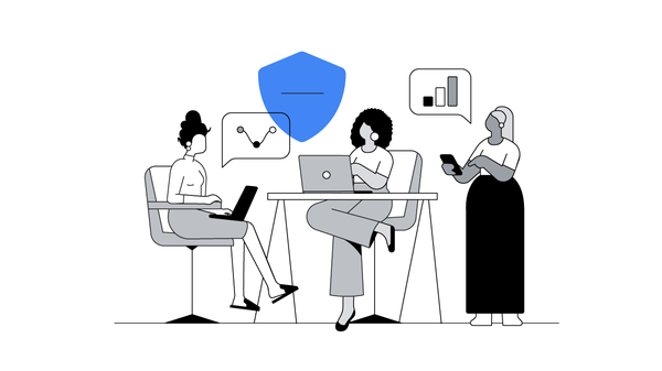 Three women of color use laptops in an office workspace as they run incrementality tests and use Google Analytics to measure their brand’s media performance.