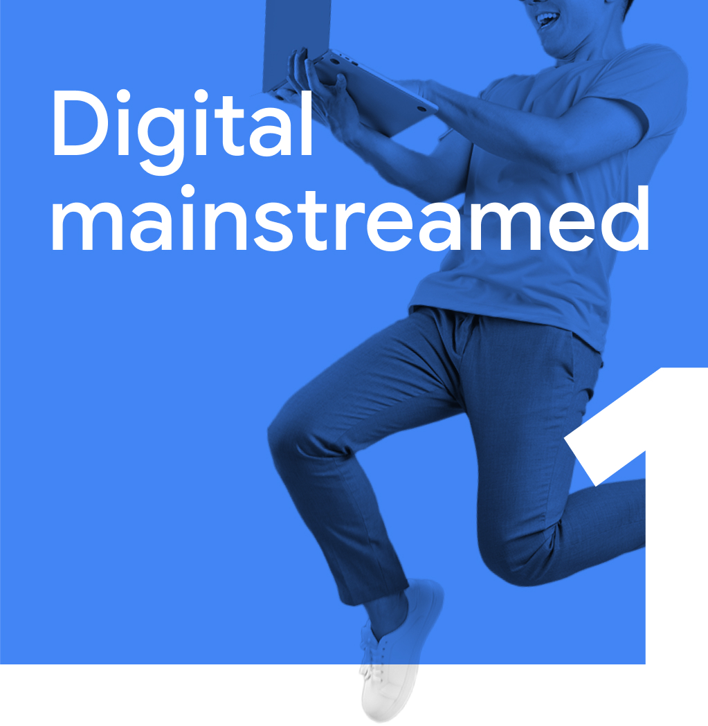 Trend 1: Digital mainstreamed. A tech-savvy man leaping with joy while holding a laptop in one hand, embracing a digital lifestyle.