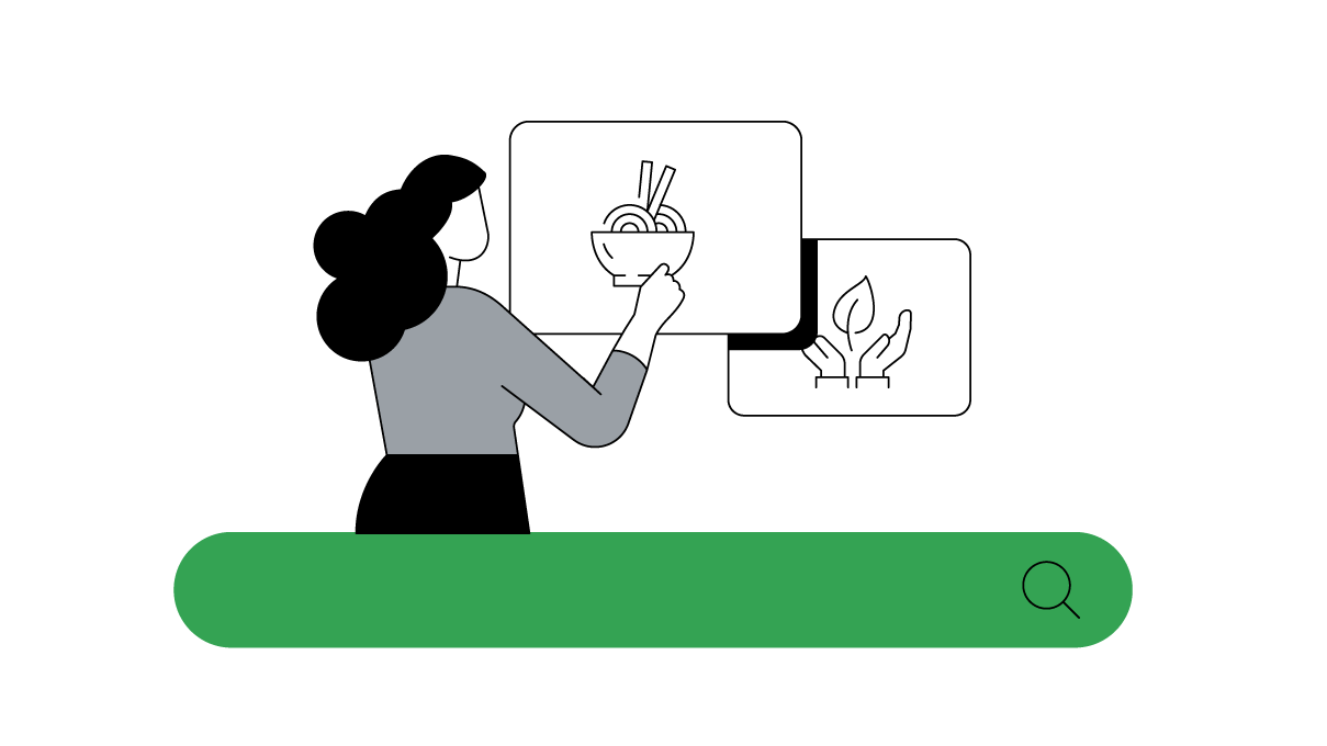 A woman with light skin and dark wavy hair stands behind a life-size search bar, facing two large squares. One contains a bowl of ramen and the other, a pair of hands holding a leaf. The woman taps on the bowl of ramen.
