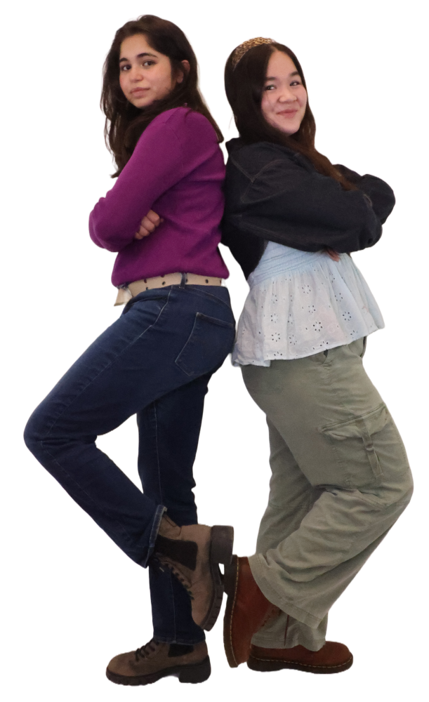 Two girls standing back to back