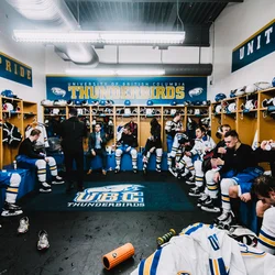 Winter Classic men's hockey team in the locker room