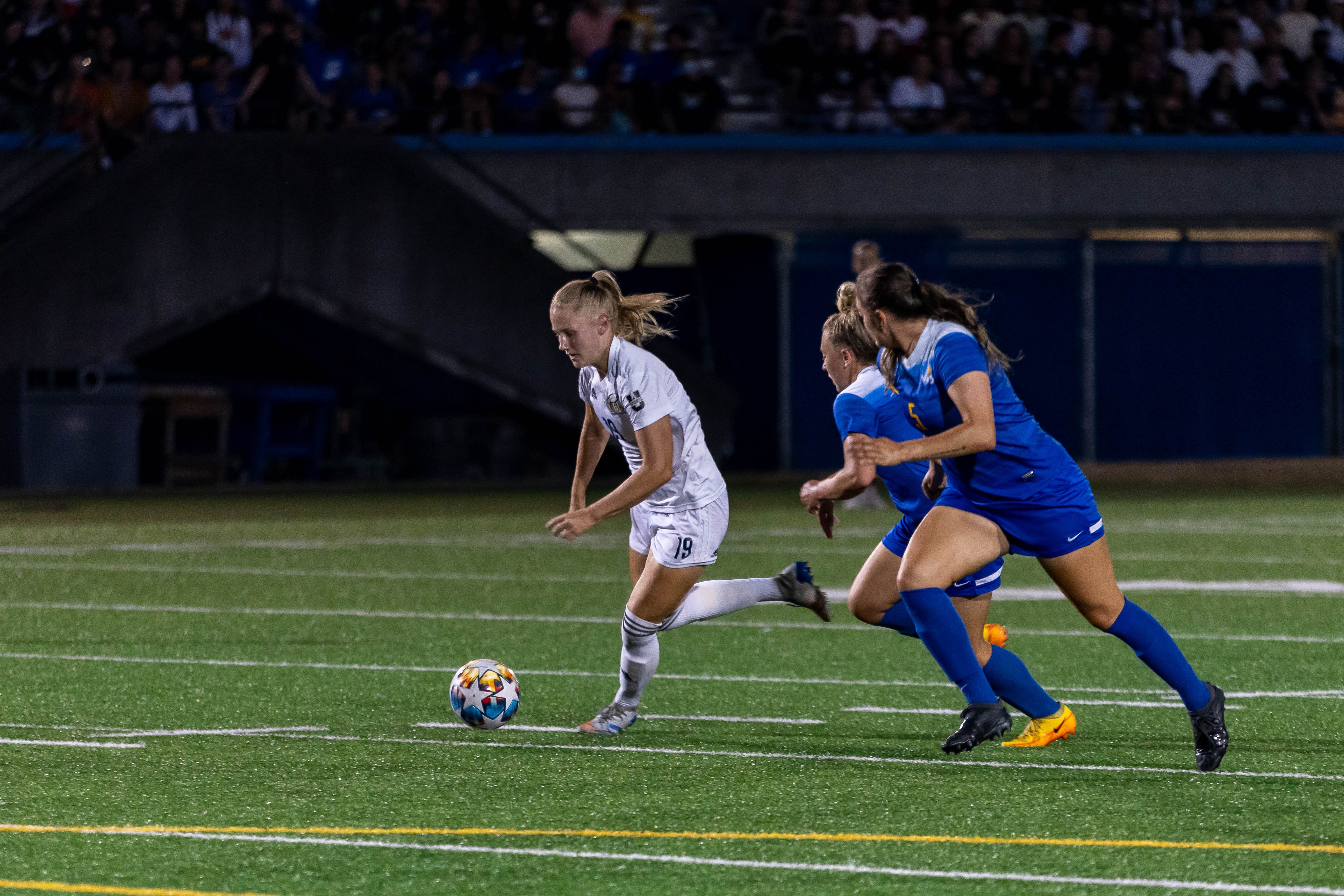 Katalin Tolnai dribbles into the box.