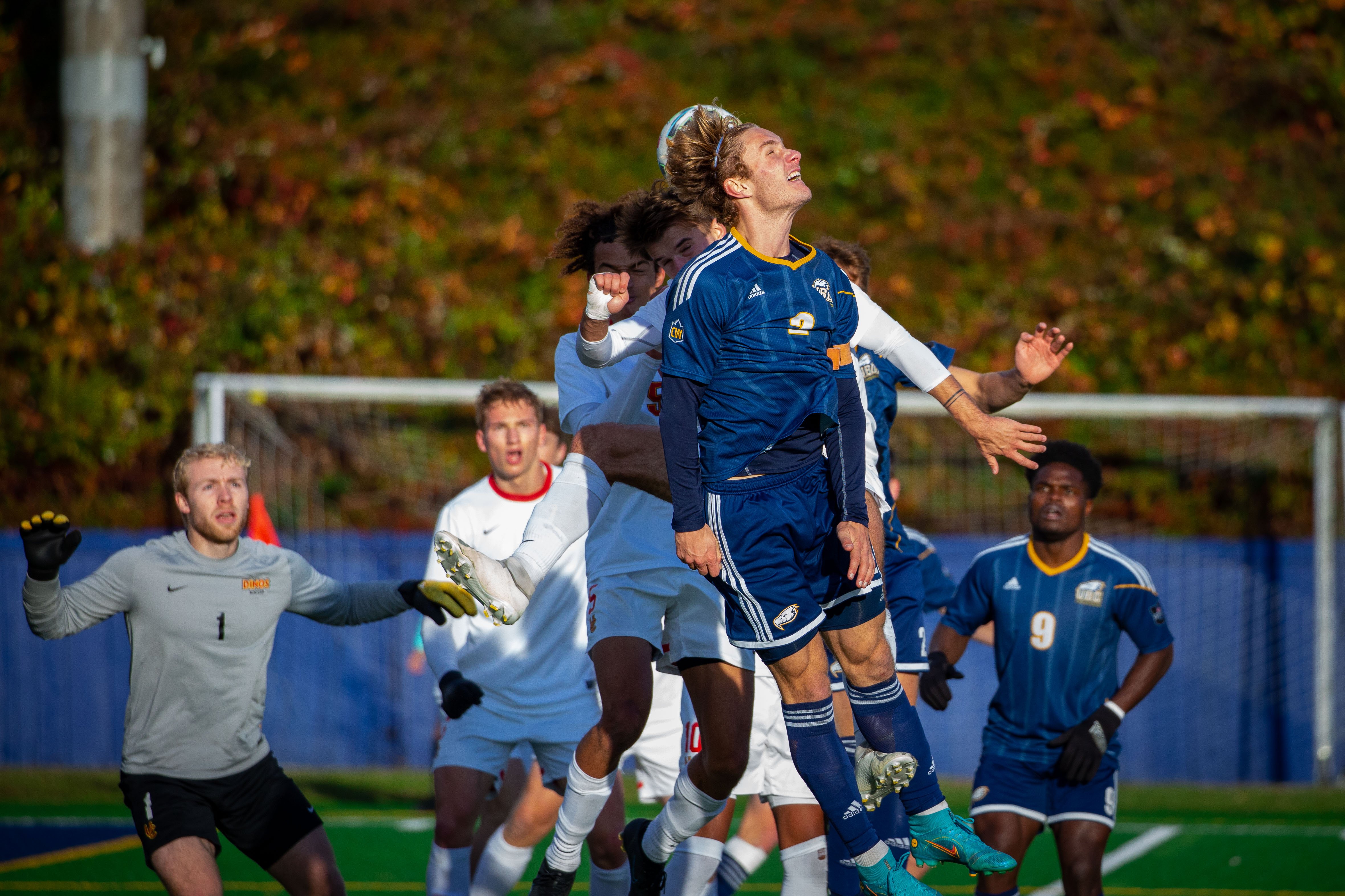 UBC's Daniel Kaiser jumps for header in Sunday's final.