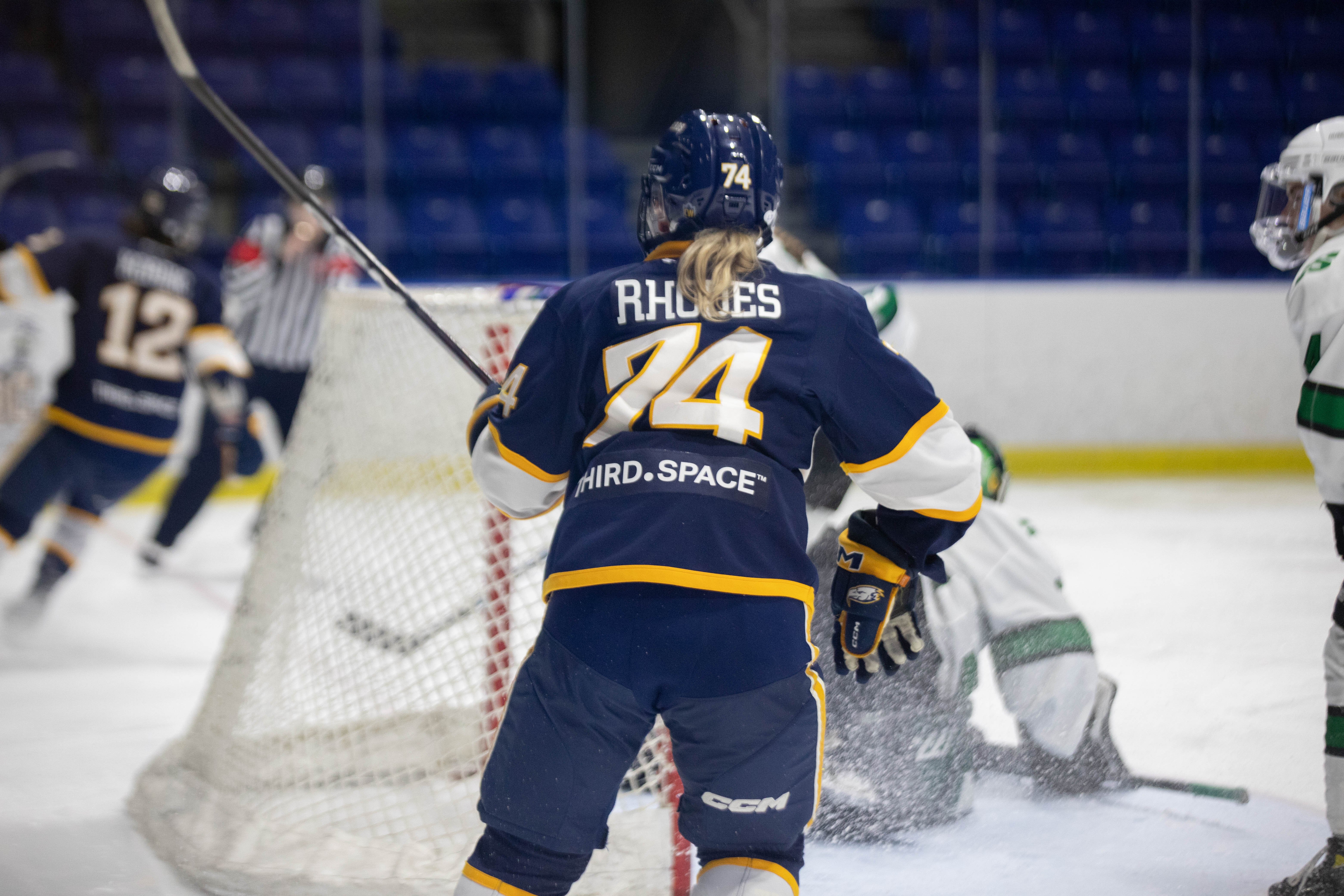 Top-goal scorer and rookie Cassidy Rhodes celebrates teammate Mackenzie Kordic's goal.