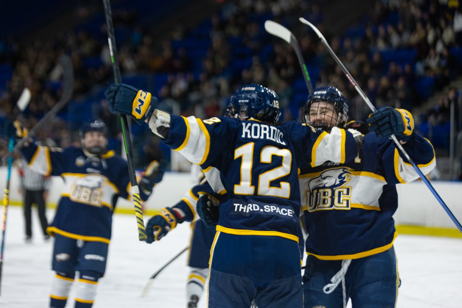 Mackenzie Kordic (#12) celebrates with her teammates.