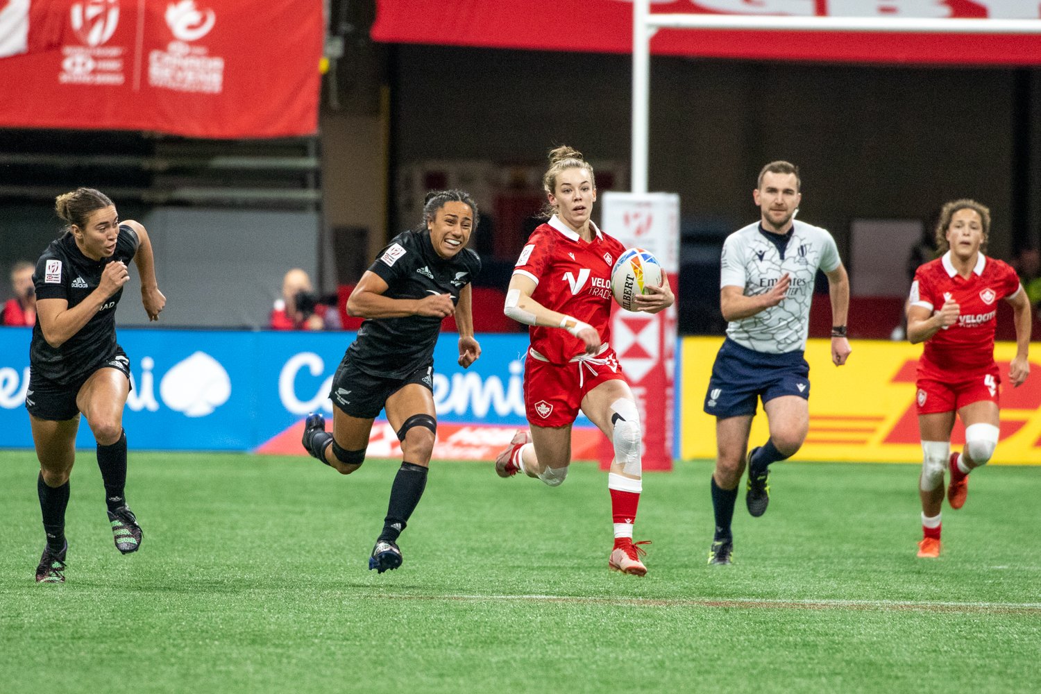 Logan (#11) makes a breakaway run in Canada's 10–5 loss to New Zealand.