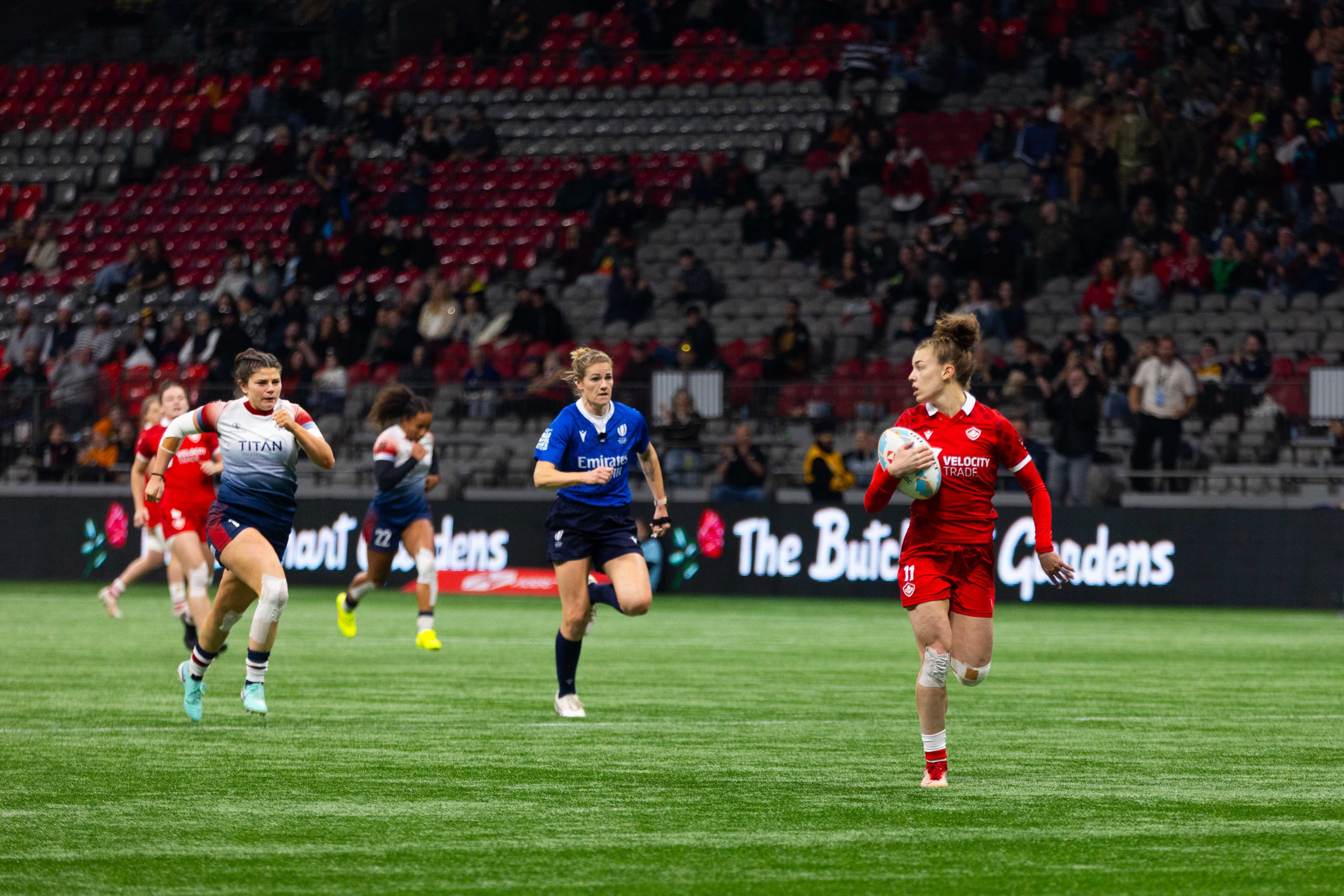 Piper Logan speeding past Great Britain for a try in round-robin play.