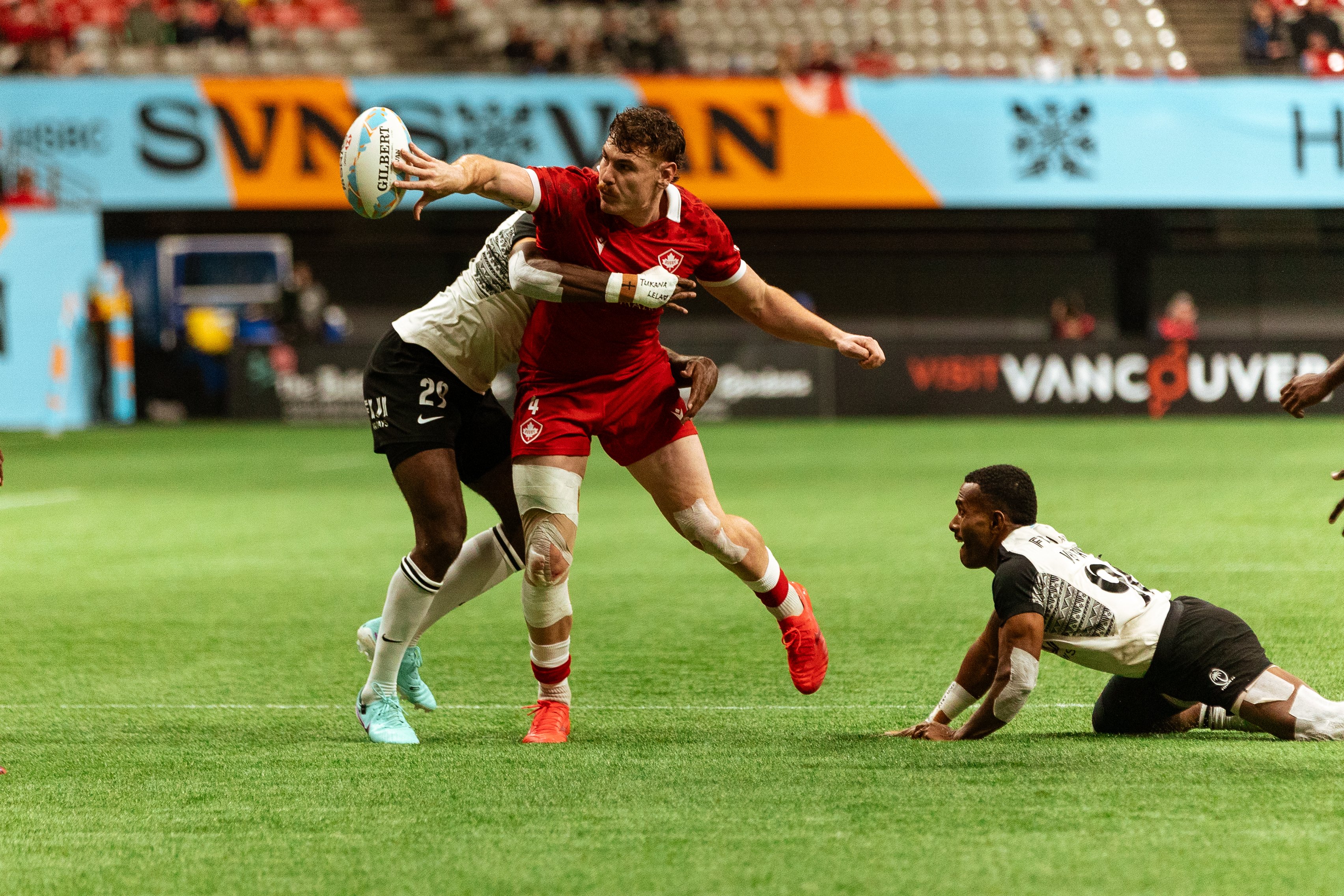 Phil Berna goes for the offload in the game against Fiji.