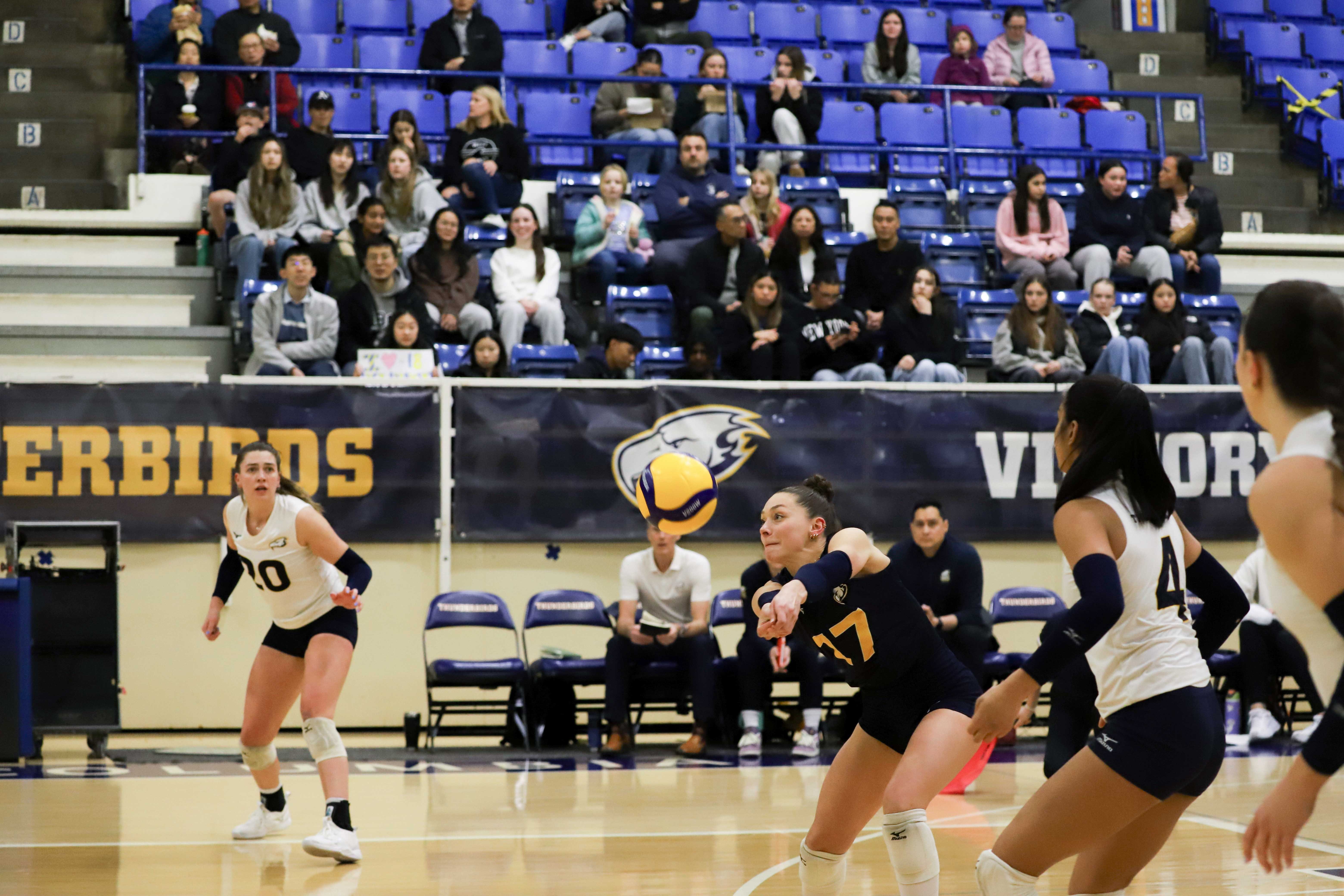 Kacey Jost passes the ball to her team.