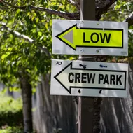 Crew park signs for on-campus filming