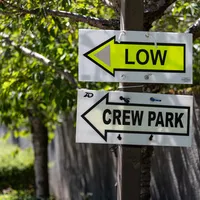 Crew park signs for on-campus filming