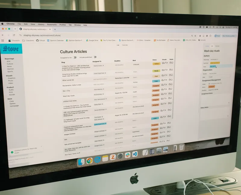 A desktop monitor displaying a list of articles in The Ubyssey's new content management system.