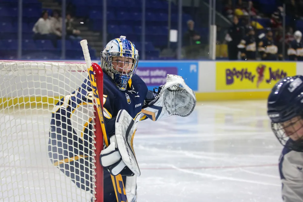 Hugens stands in goal against Mount Royal in 2024.