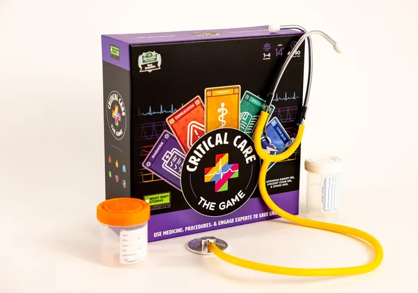 Photo of <i>Critical Care</i> game box with a stethoscope and two specimen cups.