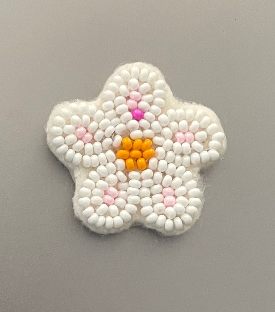 Flower beadwork by Josh McKenna, a Métis fourth-year media studies student.