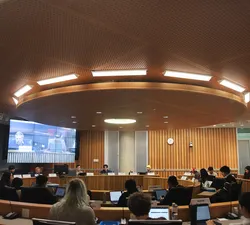 Wide eye view of Michael Kingsmill Forum, where AMS Councillors are sitting with their backs to the camera. VP Finance Gagan Parmar, President Riley Huntley, VP Admin Dylan Evans and VP Student Life Kevin Heieis are the only executives present.
