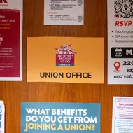 A photo of a CUPE 2278’s poster board outside their office at Thea Koerner House.