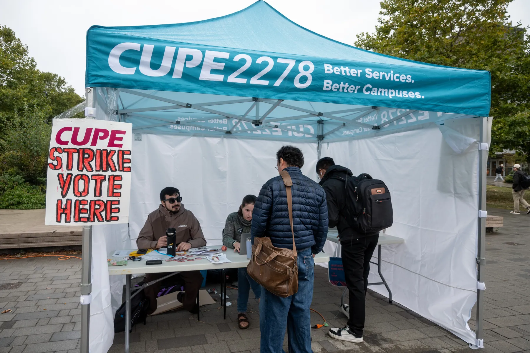 A CUPE 2278 voting station outside the UBC Bookstore.
