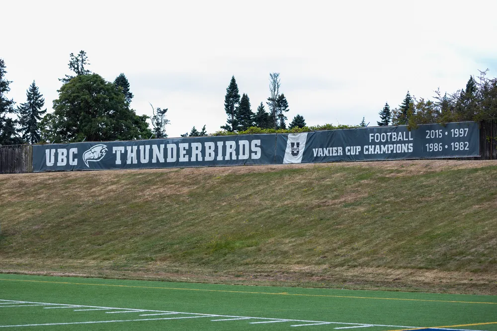The banner at Thunderbird Stadium displaying the football team's four championships.