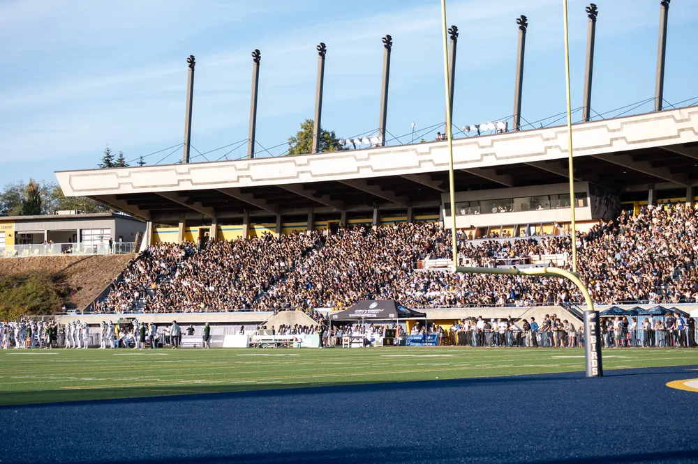 UBC fans, students and alumni fill the grandstands at Thunderbird Stadium.