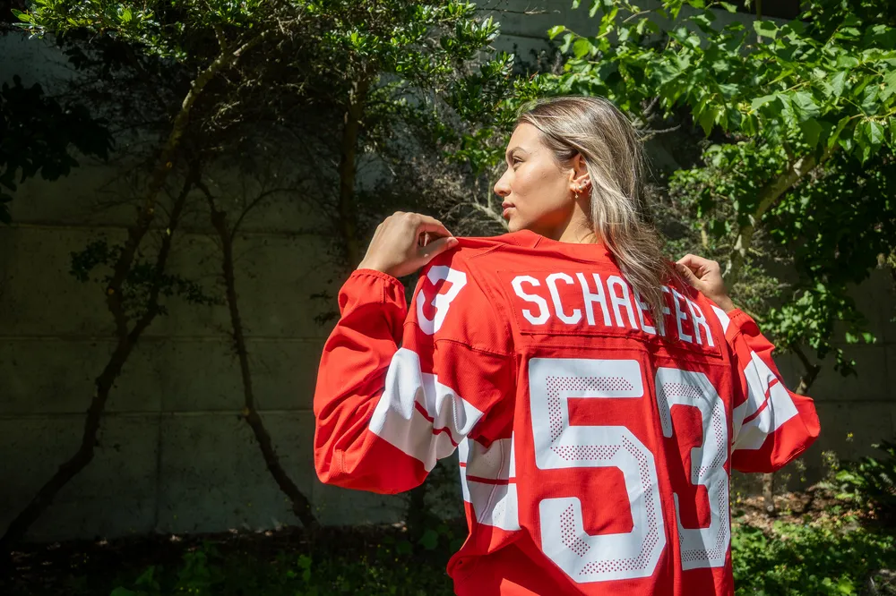 Schaefer wears her Switzerland jersey, with her back turned to the camera to display her nameplate