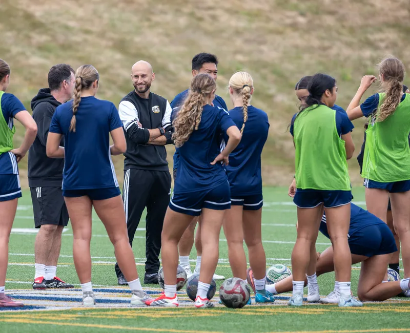 UBC Thunderbirds women's soccer players gather together before or during a match as they prepare for the 2026–27 season.