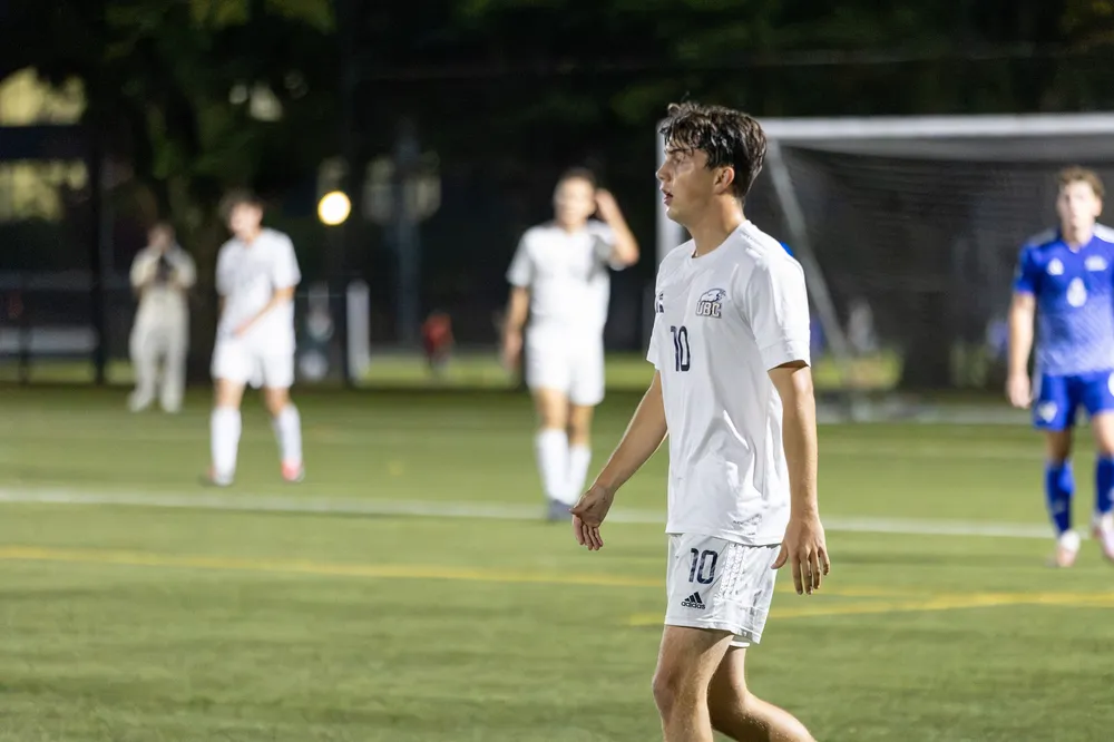 An out of breath UBC player looks out on the field.