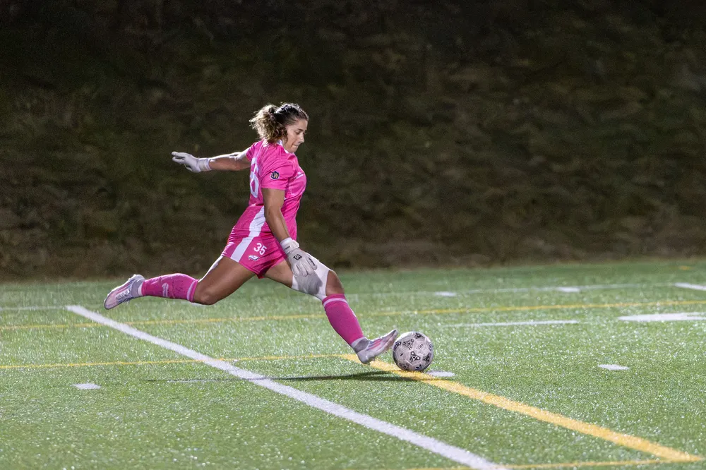 Spagnolo kicks the ball.