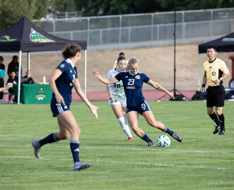 A UBC player takes a shot at the goal