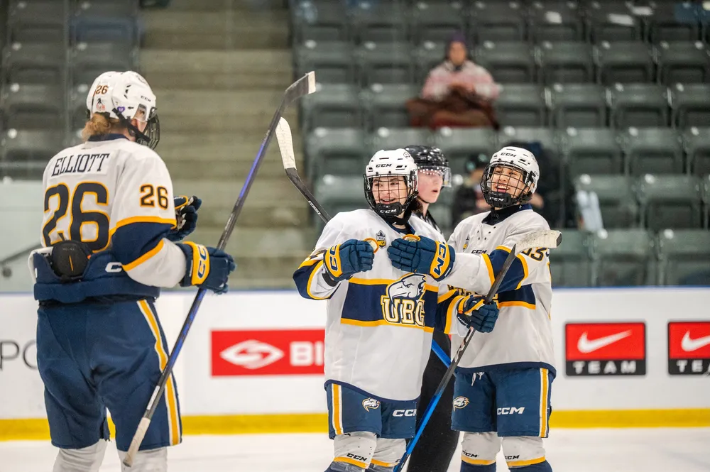 Markova celebrates with her teammates after scoring a goal against Waterloo.