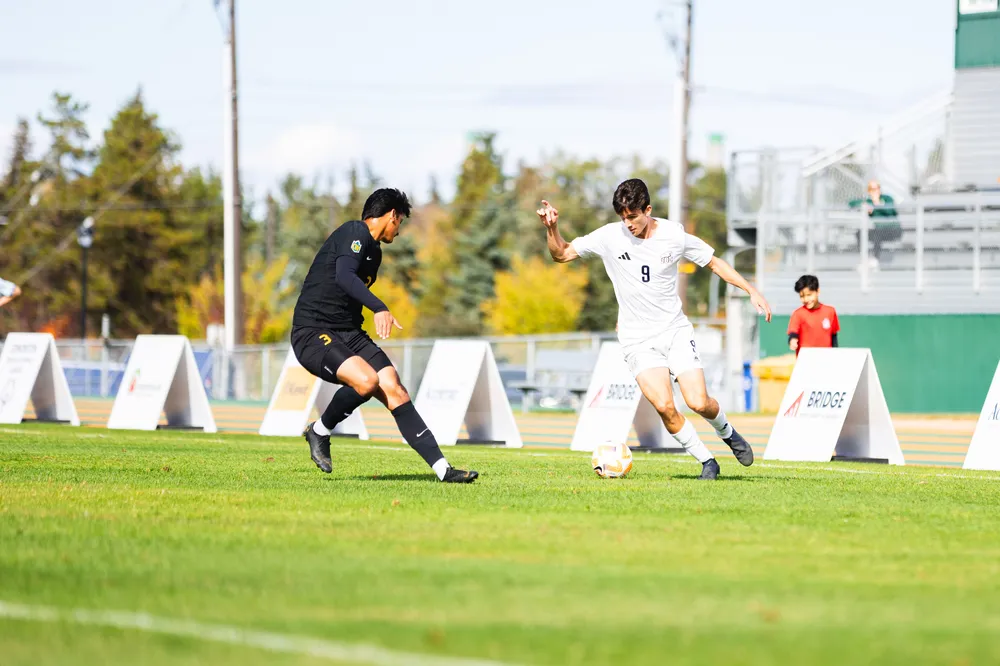 UBC forward on the field a while after scoring a goal
