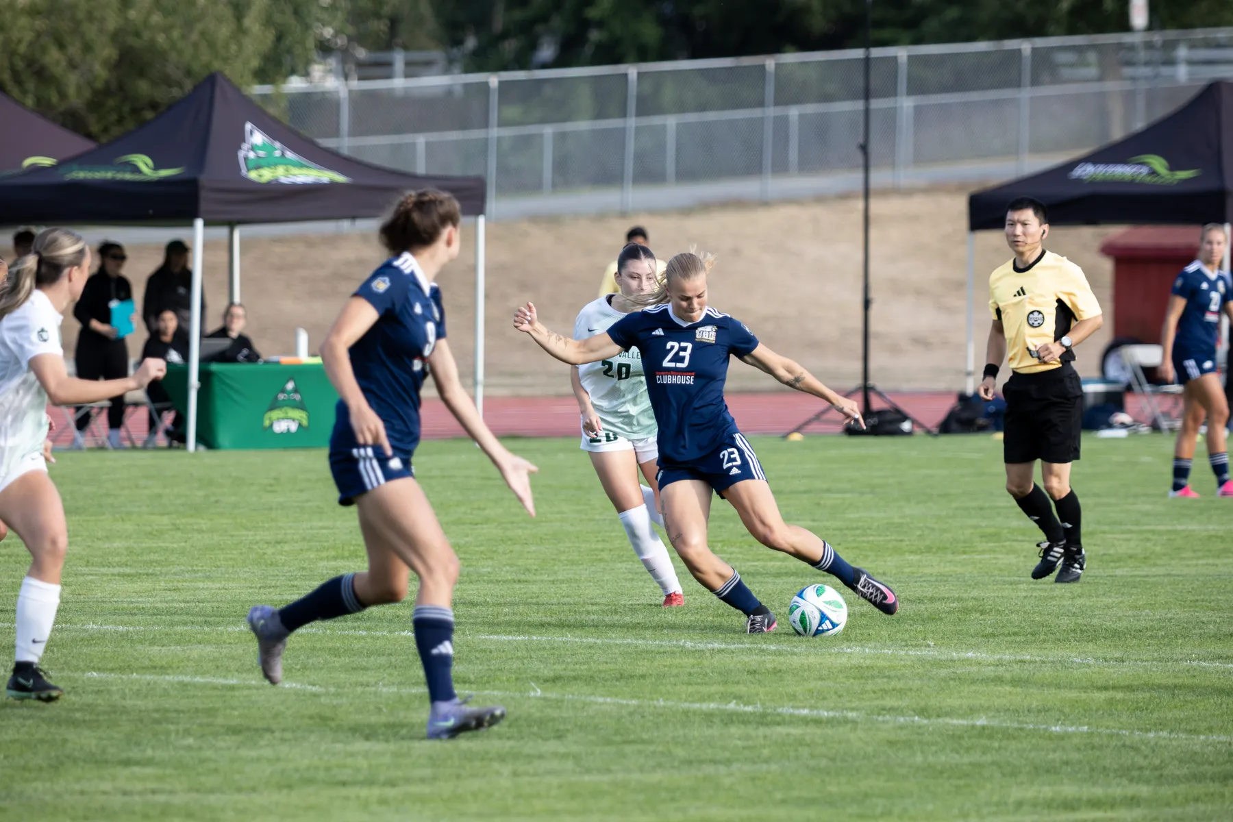 A UBC player takes a shot at the goal