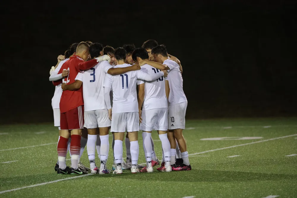 UBC forms a huddle.