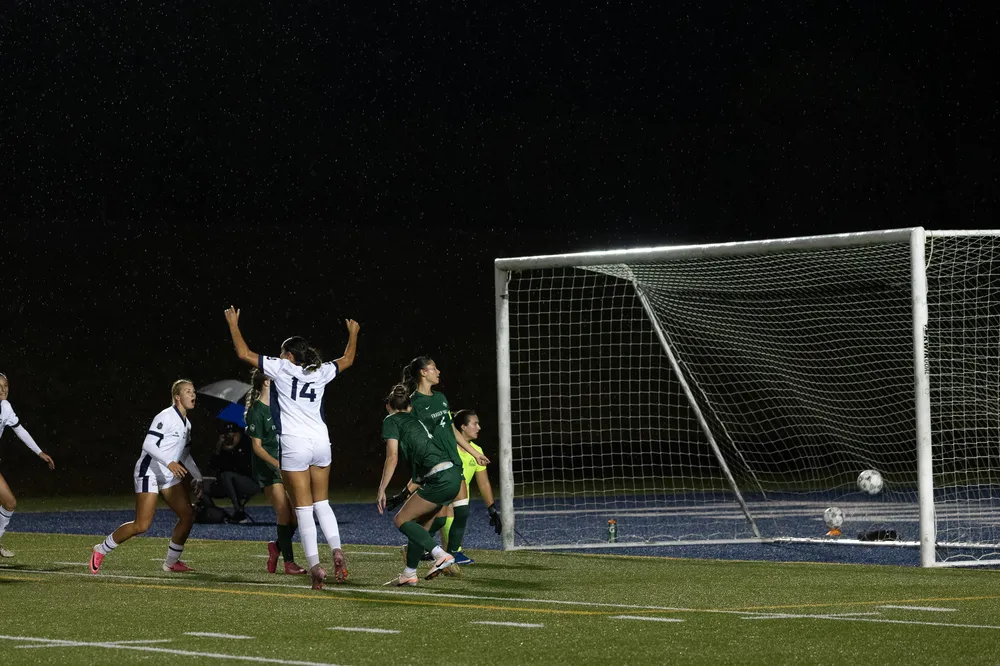 A T-Bird celebrates after scoring a goal.