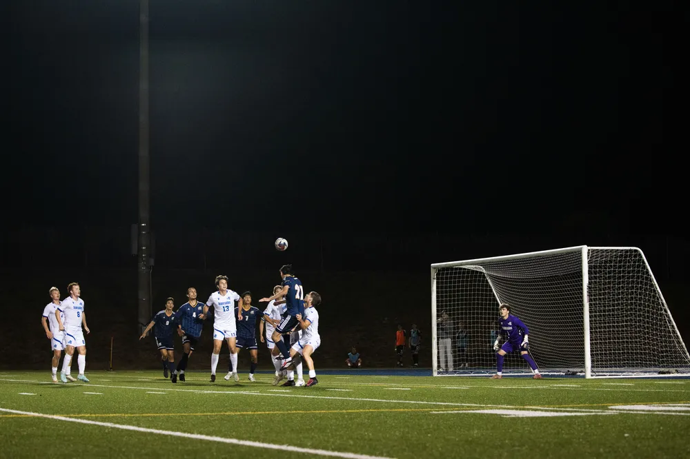 Forward Markus Rukavina passing the ball with a header.