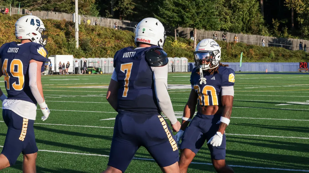 Viotto celebrates with a teammate.