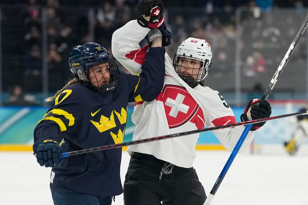 Schaefer fights for positioning with a Swedish player in the bronze medal game.