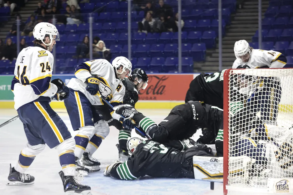 Lee crashes the Saskatchewan net with UBC's top line in tow.