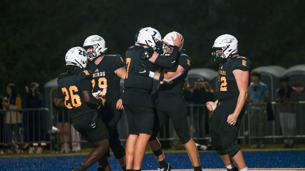 After scoring a touchdown in short-yardage, Viotto celebrates with his offensive line.