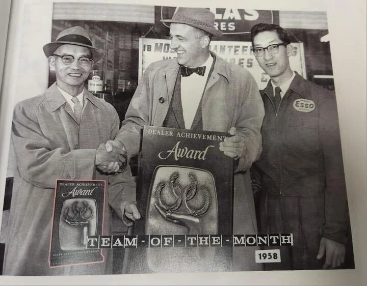 Chong's family receiving a dealer achievement award in 1958.