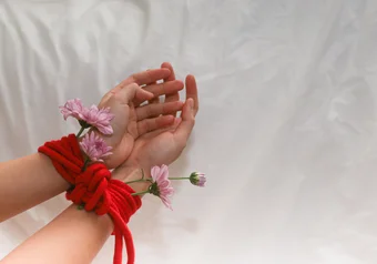 hands rope flowers