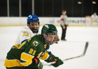 Ireland Perrot battles against U of A Pandas.