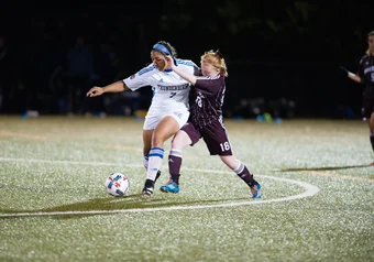 UBC #7 makes a pass during a game against UVic.