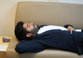 One of Zubair's friends sleeping on a couch because when midterms hit NO ONE SLEEPS