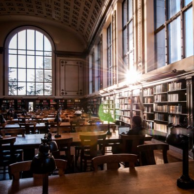 Library interior with book stacks and reading tables