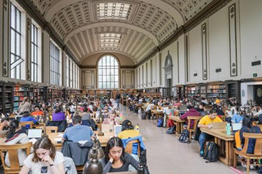 Doe Library, room of many students studying.