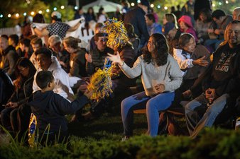 Alums, parents, and family members on Memorial Glade