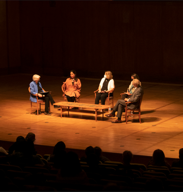 Image of Chancellor Christ and panelists on stage