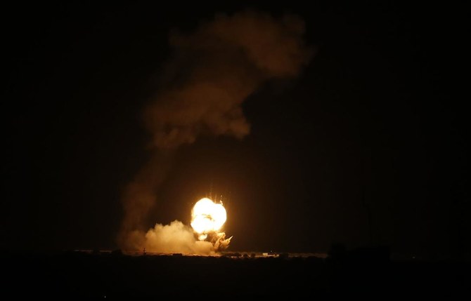 Israeli military says that Palestinian militants have fired a rocket into Israel, drawing Israeli air strikes in the Gaza Strip