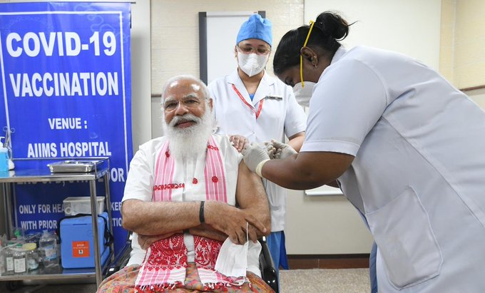 Prime Minister  #NarendraModi  takes the first dose of the #COVID19Vaccine at AIIMS in New Delhi.